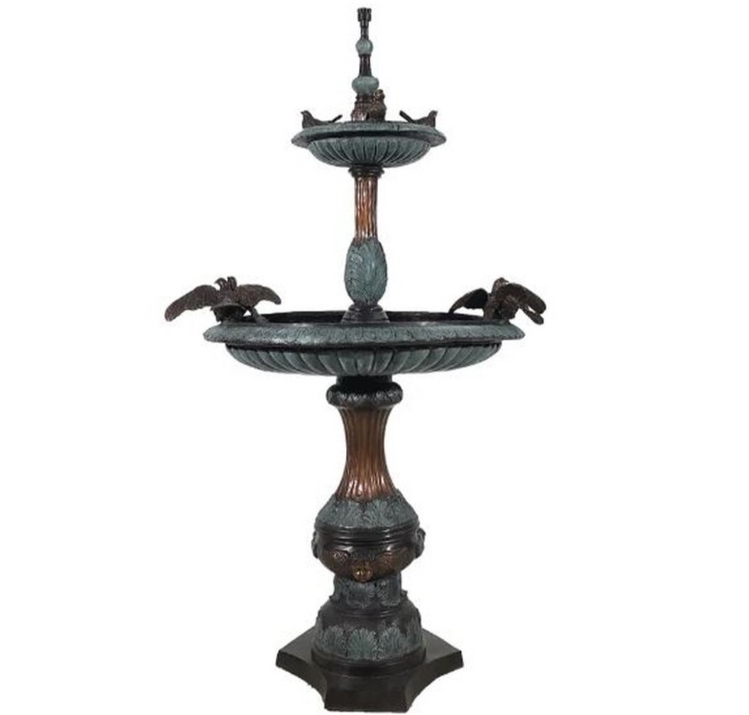The bronze dove two-tier fountain sculpture features meticulous hand-forged details and a beautiful brown and green fire-applied patina.