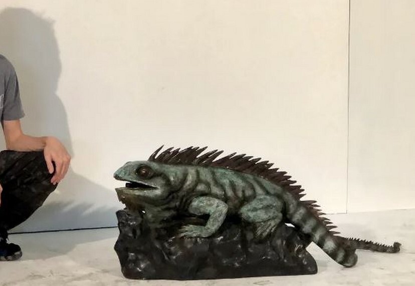 This sculpture resonates with wildlife enthusiasts, collectors of exotic animal art, and anyone who appreciates the unique beauty of reptilian forms.