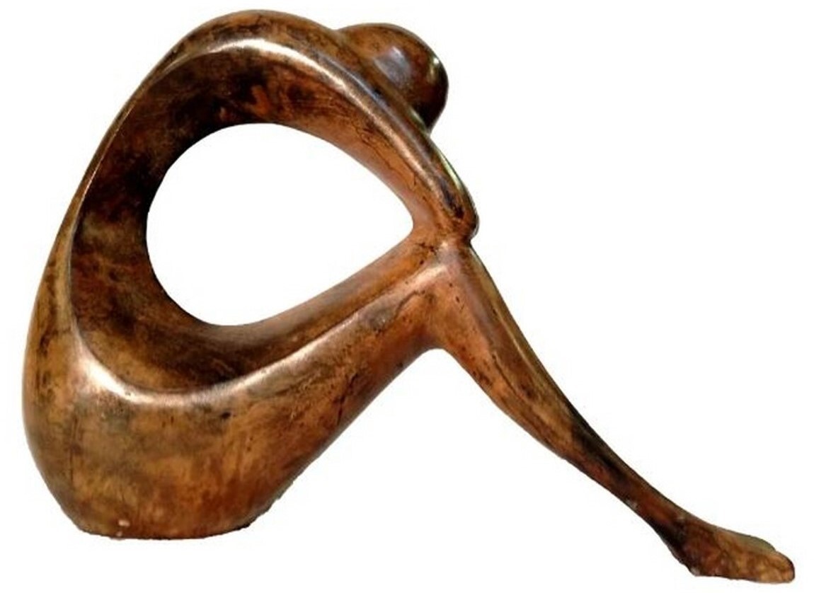 This bronze contemporary tabletop sculpture features a long-leg subject sitting in a pensive pose. 