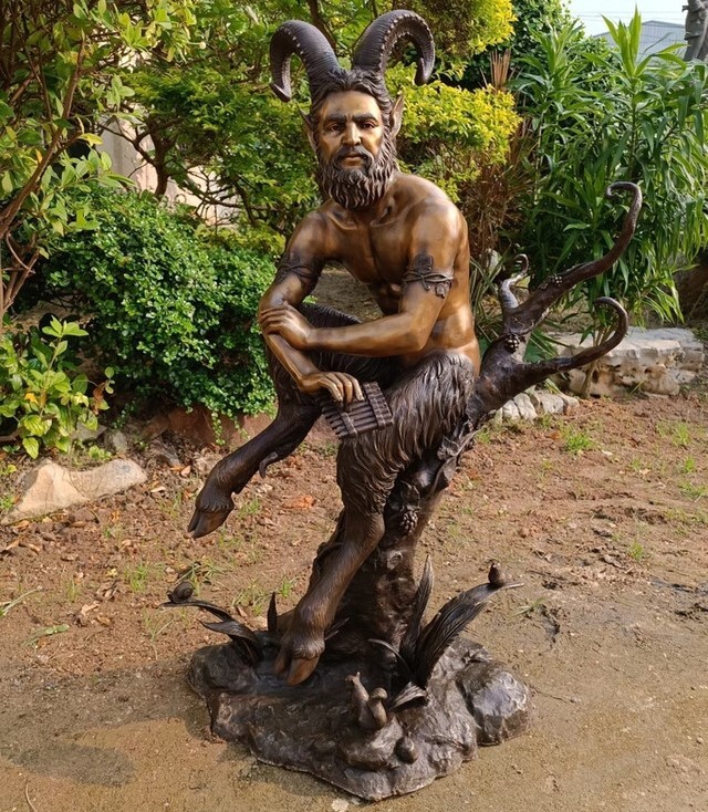 This bronze sculpture brings to life the Greek mythological god Pan holding his panpipes.