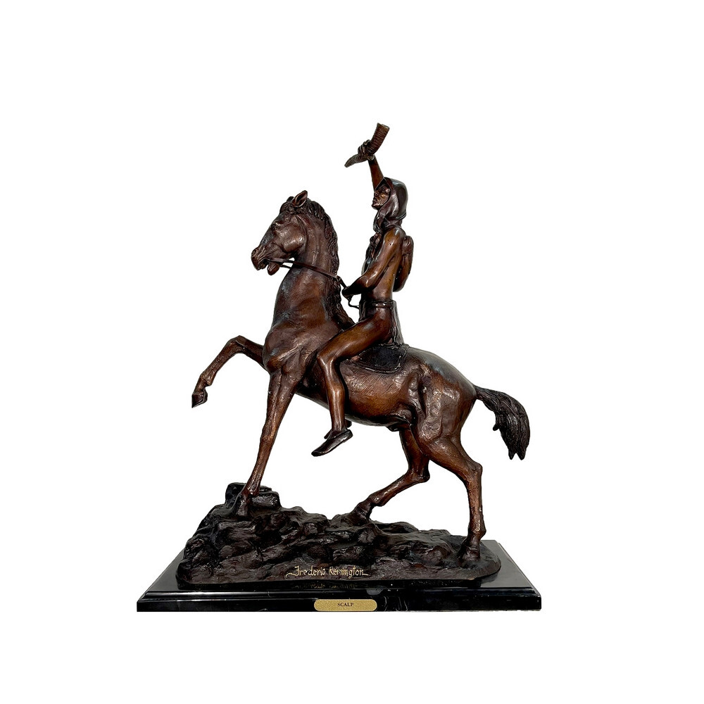 Introducing the Bronze Remington &lsquo;Scalp&rsquo; Tabletop Sculpture atop a Marble Base. Crafted using the traditional Lost Wax Casting method, this sculpture ensures pristine quality and vivid detail. Each piece features a beautiful brown fire-applied patina, making it a stunning addition to any space.