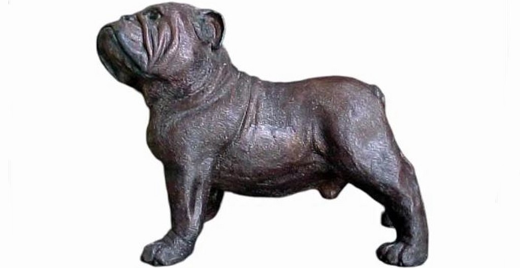 Introduce a charming piece of traditional craftsmanship to your space with the Bronze Small Bulldog Sculpture.