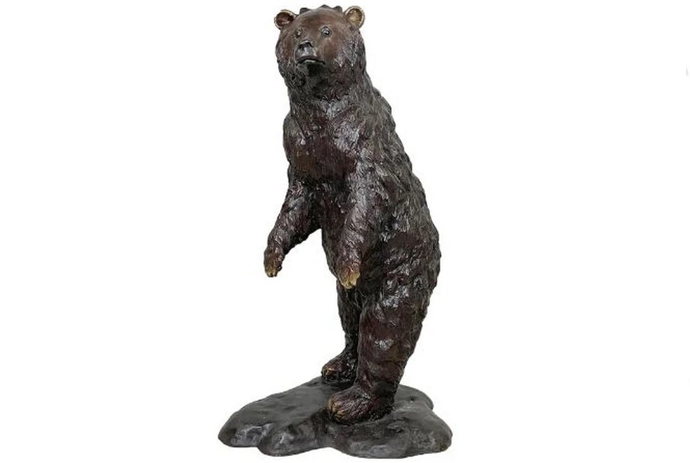 Introduce a touch of wilderness to your space with the Bronze Standing Puff Bear Sculpture.