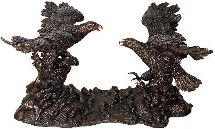 The spectacular bronze dining table base sculpture features two eagles with outstretched wings ready to challenge each other.