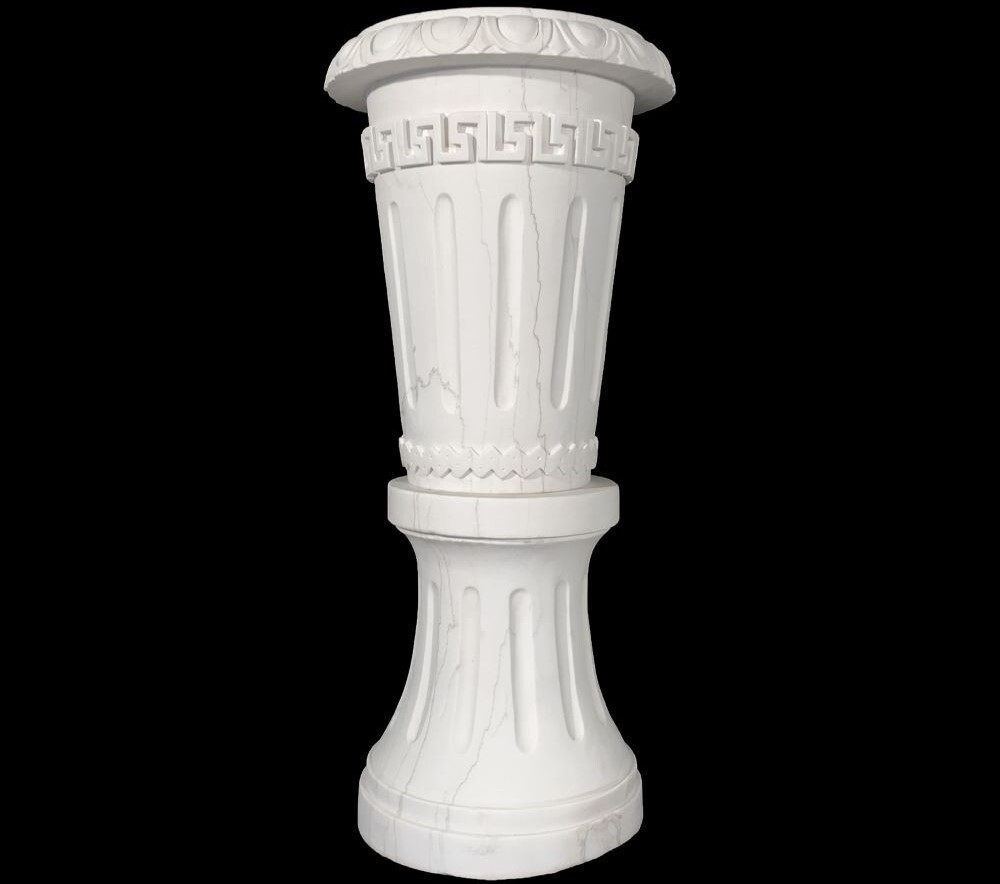 Elevate your interior or exterior design with the Marble Hearst Castle Casa Del Sol Urn atop Pedestal, a masterfully carved work of art inspired by the grandeur of Hearst Castle.