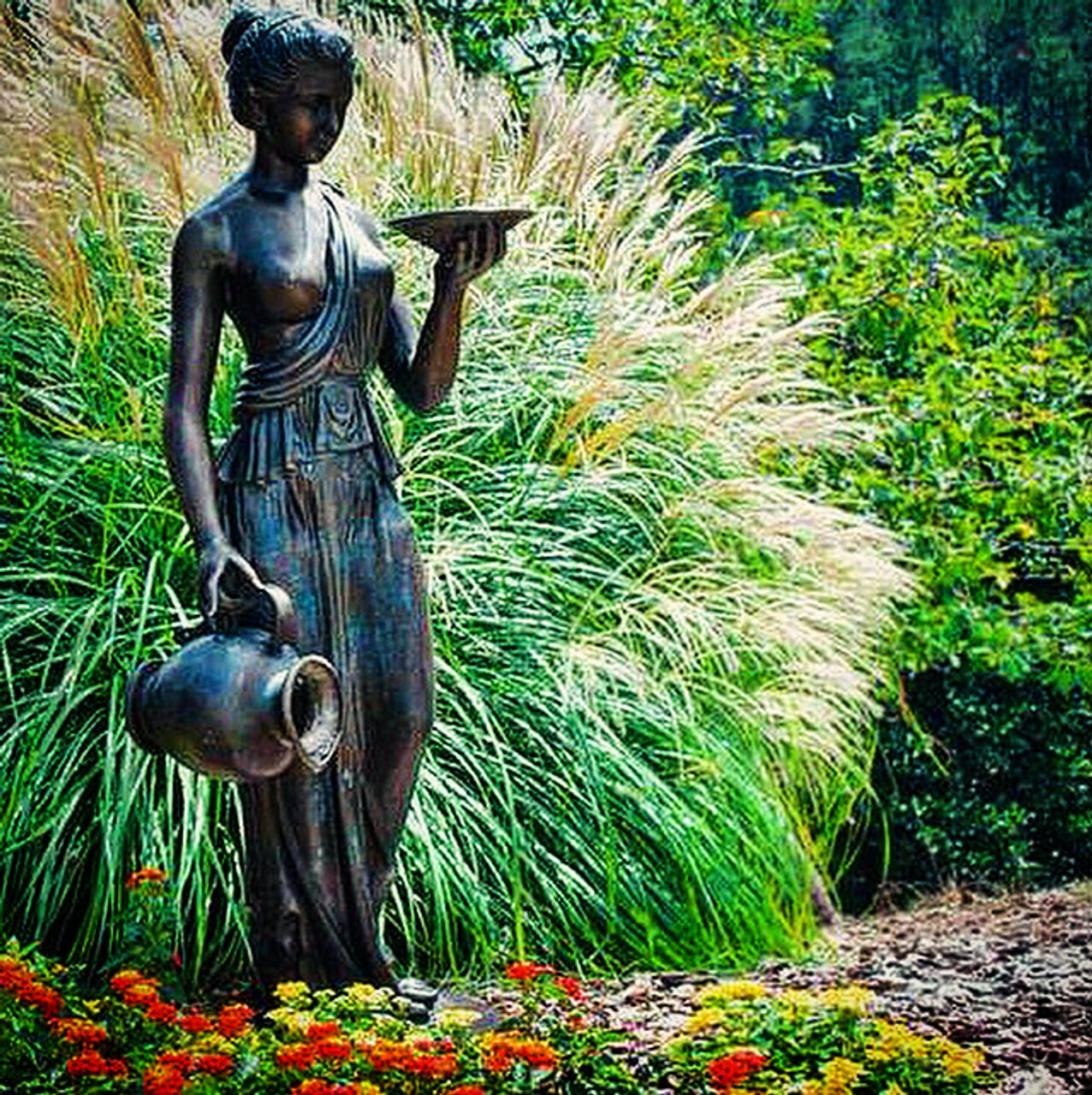 The Standing Lady Holding Jar Fountain is a testament to the enduring allure of classical artistry and the skilled craftsmanship of bronze casting.